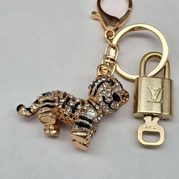 Authentic Louis Vuitton Lock & Key with unbranded Tiger Bagcharm, Keycharm - Picture 8 of 9